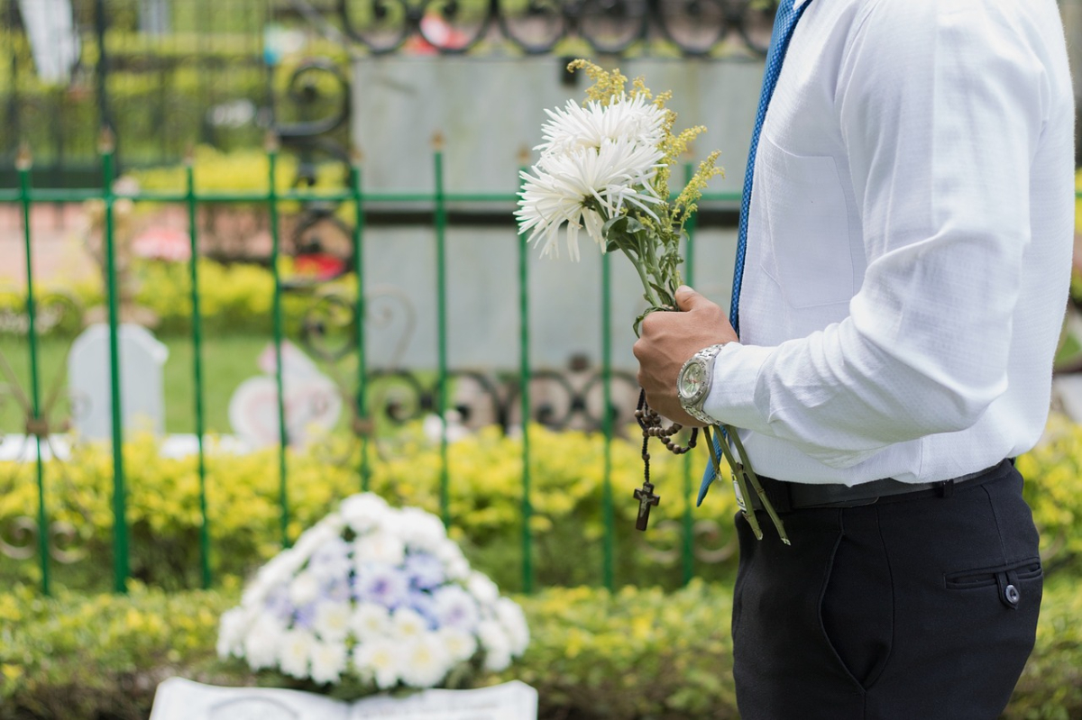 man-holding-flowers